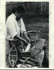 Press Photo A woman prepares corn silk at Ste. Marie Among the Hurons, Midland picture