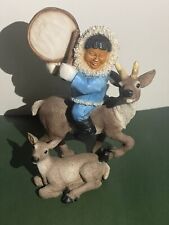 Castagna Laughing Eskimo Child Riding A Deer Figurine 1995 Blue Brown White picture