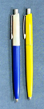 2- Late 60s - 70s  BANKERS Yellow, Blue & White Retract. BP Pens. Cuuuute picture