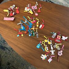 A Vintage Assortment of 1980s BELL Plastic Charms and More picture