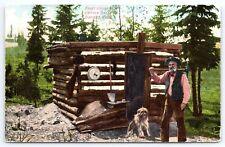 Postcard First House in Cripple Creek District, Colorado Man with Dog picture