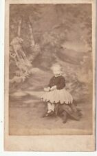 CDV PHOTO - TINY GIRL IN PAINTED WOODLAND BACKDROP. NO  STUDIO picture