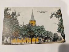 A Pretty Residence Street Juneau, Wisconsin Church Scene postmarked 1919 picture