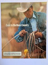 Print Ad Marlboro Country Cowboy Holding Rope picture