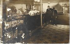 Men in old bar; Charter Cigars ad, showcase full of cigar boxes; nice 1910s RPPC picture