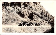 RPPC Line of Cars Stopped On Road Next to Hill c1910s photo postcard FQ4 picture