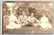 Original RPPC Couples Portrait Sitting On Grass Hats Photograph Antique Postcard picture