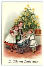 1907-15 Postcard A Merry Christmas Tree Candles Kids Doll Baby Carriage picture