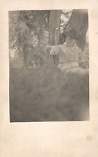 Vintage Postcard 1910's Portrait Woman with Eyeglass and Hat Sitting Under Tree picture