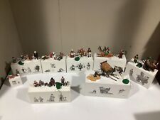 HUGE LOT OF DEPARTMENT 56 FIGURES AND PEOPLE WITH BOXES picture