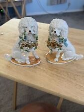 Set Of 2 Antique Victorian poodle holding a basket of gold piglets numbered. picture