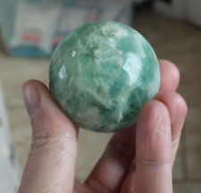 FEATHER/ SNOWFLAKE FLUORITE SPHERE 47.5 MM/ 178 GRAMS picture