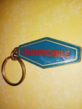 Vintage OLDSMOBILE Keychain Car Vehicle Make Logo Teal Red Gold metal brass ring picture