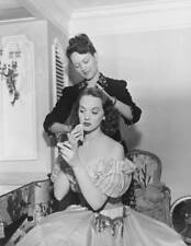 Lucille Bremer has her hair done by hairdresser Florence Ericks - Old Photo picture