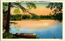 1940'S LINEN. SUNRISE ON LAKE OSCEOLA. HENDERSONVILLE, NC POSTCARD SC1 picture