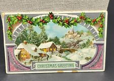 1909 Embossed Christmas postcard, Snowy Village, Holly, posted picture
