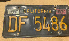 Vintage CALIFORNIA BLACK AND YELLOW LICENSE PLATE WITH '68 & '69 STICKERS picture