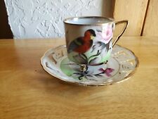 Vintage Teacup And Saucer with Parrot sitting Rose Stem with gold edging picture