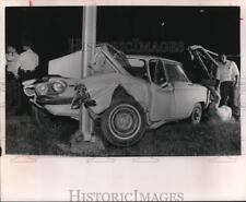 1963 Press Photo A compact car crashing on a pole along the Sabine cutoff picture