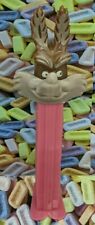 PEZ -Vintage Wile E. Coyote - pink stem thin footed picture