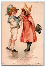 1905 Happy New Year Children Fixing Bonnet Concord MA Tuck's Antique Postcard picture