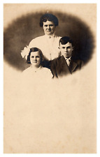 postcard RPPC Mother and her two children Kruxo stamp box c1907-1920s L2886 picture