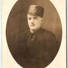 c1910s Johnstown, PA Man Military Hat Cap? RPPC Real Photo Red Front Studio A141 picture