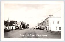 Postcard RPPC Imperial Ave. Gas Pumps and Attendant Wilkie SK Canada c1930s picture