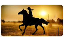 COWGIRL HORSE RIDING SUNSET USA MADE LICENSE PLATE picture