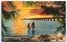 FL Florida Keys, Sunset on Overseas Highway, Couple Wading in Water, Linen Unp picture