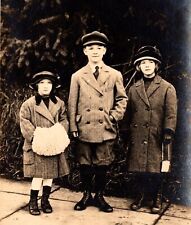 THREE ADORABLE SIBLINGS  : WINTER CLOTHES :MUFF : PURSE : CYKO : RPPC  1904-1920 picture