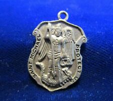 Vintage St Michael Protect Us Meda PEWTER Shaped Like Police Shield picture