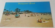 Vintage 1960s postcard sun bathing on crowded Hollywood Beach Florida picture