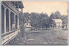 South Haven Michigan~Man Leans Over Porch of The Avery Beach Hotel 1907 Postcard picture