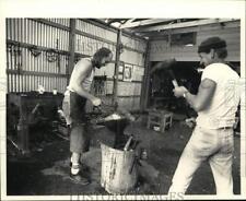 1983 Press Photo Michael Moore, Blacksmith works with Man - hps08070 picture