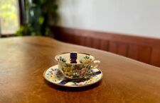Vintage Miniature Porcelain Hand Painted Floral Teacup & Saucer picture