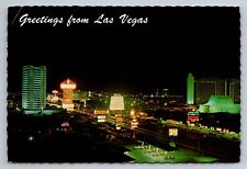 Greetings From Las Vegas Strip At Night Nevada Vintage Posted 1976 Postcard picture