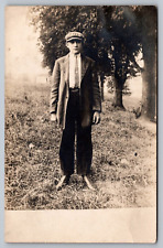 Well Dressed Boy in Suit & Cap Standing in a Field-VTG RPPC Postcard-Early 1900s picture