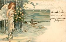1905 German Christmas Postcard Weihnachten Angel in Toga w/Xmas Tree, Snowy Town picture