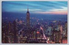 Majestic Twilight View of New York City 1966 Postmarked Vintage Postcard picture