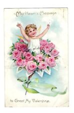 Early 1900's Tucks Valentine Postcard Cherub in a Bouquet of Roses picture