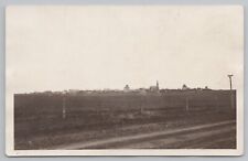 RPPC Field with Buildings, Church  c1920 Real Photo Postcard picture