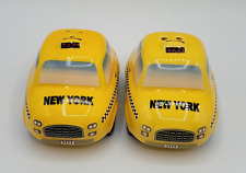 NEW YORK CITY YELLOW TAXI CAB SALT AND PEPPER SHAKERS COLLECTIBLE picture
