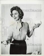 1959 Press Photo Model poses in a blouse by Macshore in apricot pure silk picture