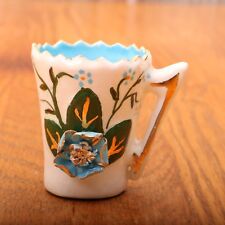 Vintage Tiny Porcelain Cup With Blue Flower picture