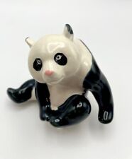 Cute Sitting Panda Figurine with a Pink Nose picture
