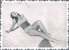 1960s Beautiful Cute Girl in a Swimsuit Resting on the Beach Vintage Photo picture