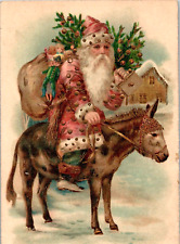 1920s GERMANY Christmas Postcard Rose Suited Santa Rides Donkey Carries Tree picture