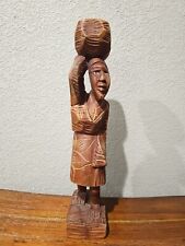Vintage Hand Carved Wooden Folk Art Statue of Woman holding Basket picture
