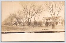 Lenox Iowa~Dirt Street~Winding Long Home w/Porch~Cookie-Cutter Homes c1910 RPPC picture